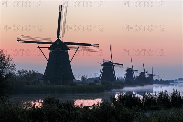 Historical windmills with dawn