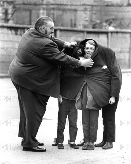 Big man with children