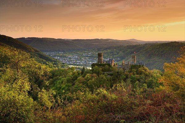 View of Thurant Castle in the Moselle Valley at sunset in autumn