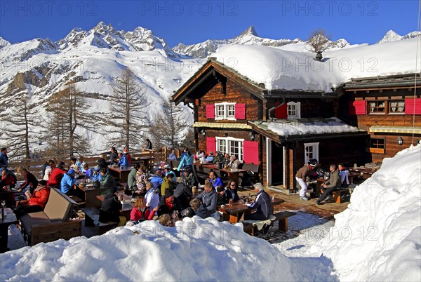Mountain inn with sun terrace in winter on Riffelalp 2222m