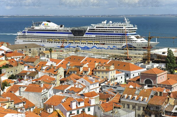 View from Miradouro das Portas do Sol on river Tejo with docked cruise ship