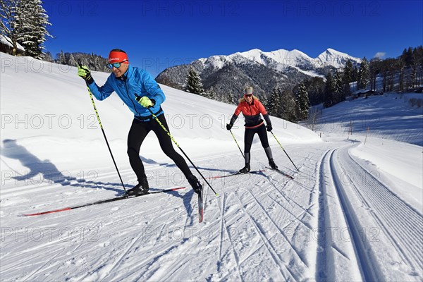 Olympic silver medalist Tobi Angerer with his wife Romy on the cross-country ski trail of Winklmoos-Alm