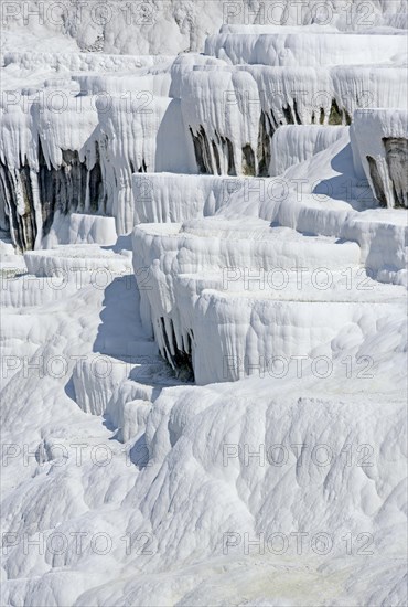 White travertine limestone rock formations known as the cotton castle