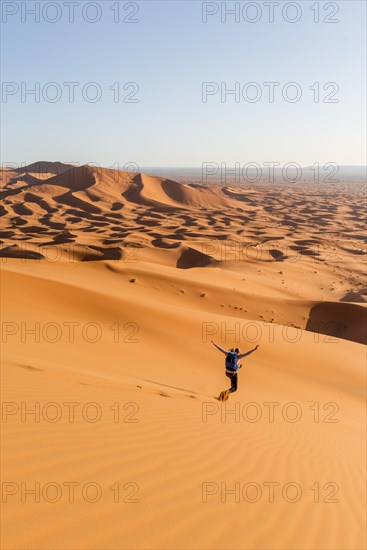 Woman running downhill