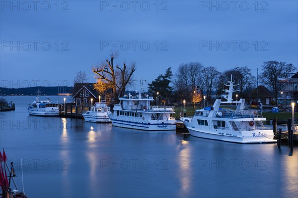 Baltic Sea harbour with boats at dusk