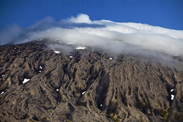 Volcano and glacier Snaefellsjokull with summit in clouds