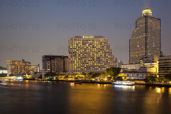 Lebua State Tower with hotel on the Chao Praya River