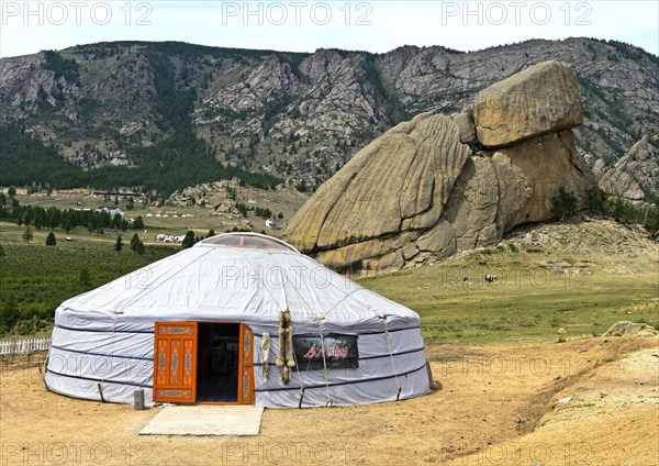 Yurt in front of the rock formation turtle