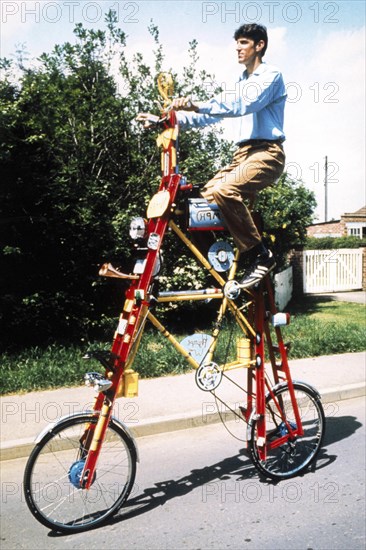 Man on a curious bicycle