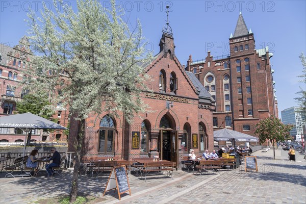 Fleetschlosschen in front of old warehouses in the Speicherstadt