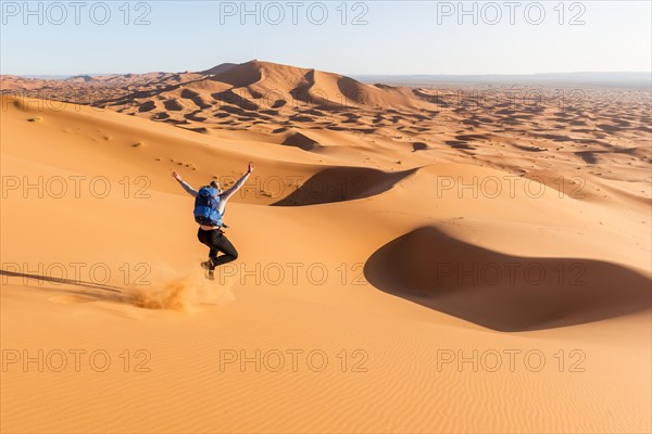 Woman running downhill