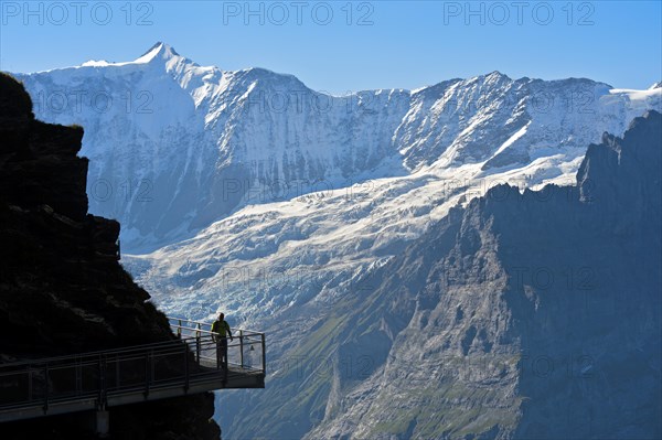 Tourist on the First Cliff Walk by Tissot in front of the Fiescherhorn north face and the Grindelwald glacier