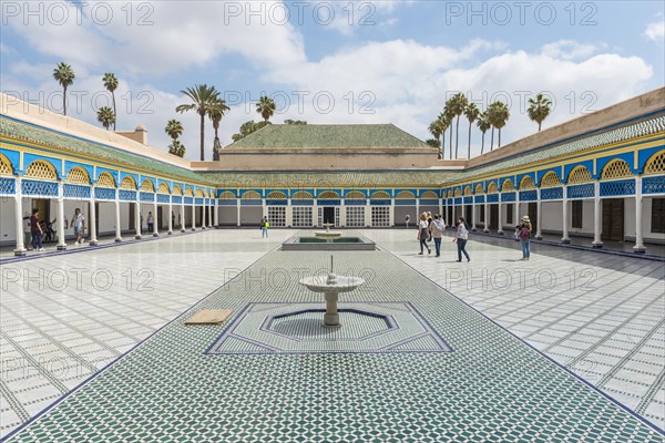 Ornate courtyard with columns and fountain