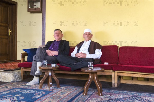 Locals sitting on a bench