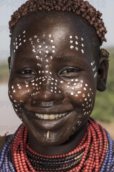 Young woman with face painting