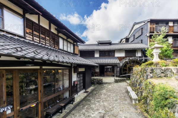 Houses with water wheel