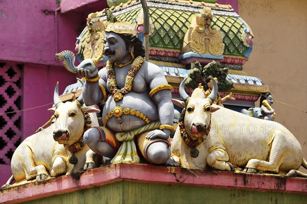 Colorful Hindu temple decorated with figures and gods