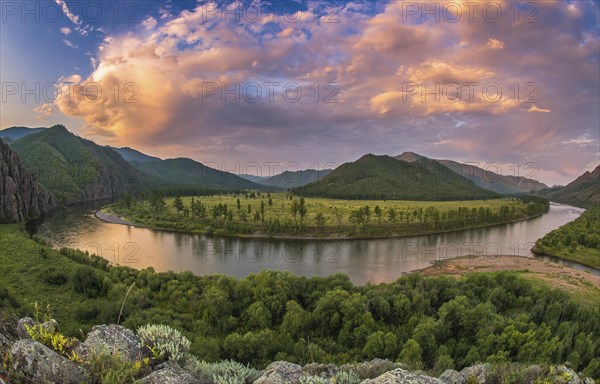 Dramatic clouds during dusk over Tuul river