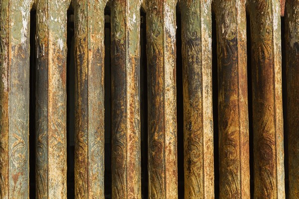 Close-up of rusted antique hot water heating radiator