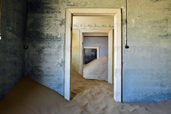 Desert sand in the ruined building of the former diamond city