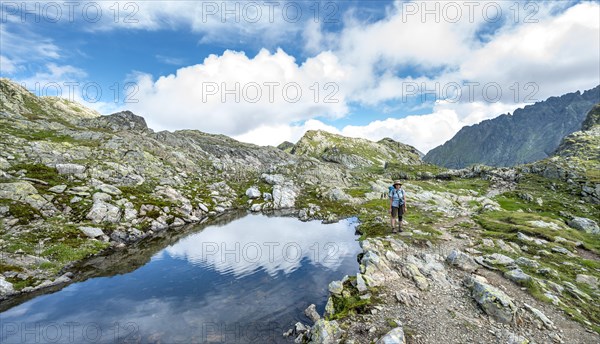 Hiker at a small lake
