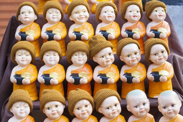 Monk toy puppets on display at the evening market