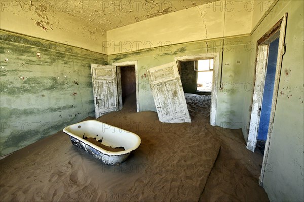 Desert sand in the ruined building of the former diamond city