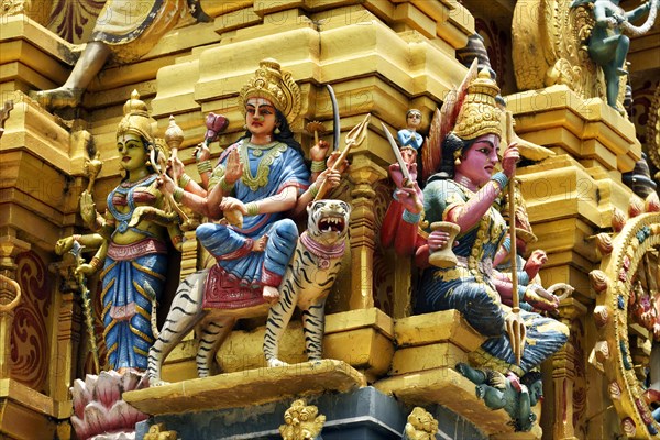 Colorful Hindu temple decorated with figures and gods
