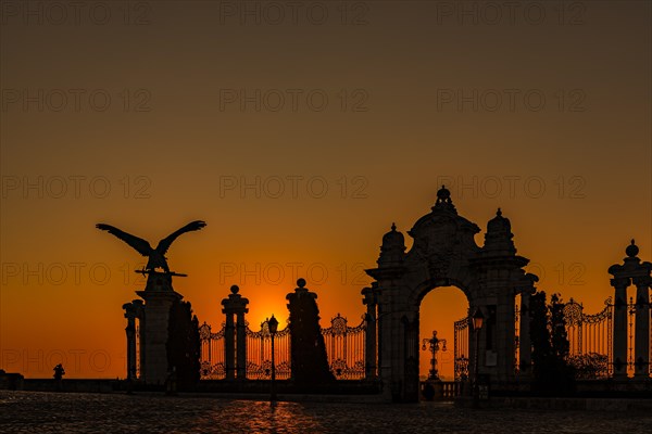 Sunrise with statue of the mythical Hungarian eagle