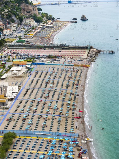 Tourist lido with umbrellas and sunbeds