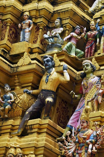 Colorful Hindu temple decorated with figures and gods
