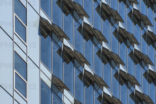 Ventilation flaps on windows in skyscraper facade