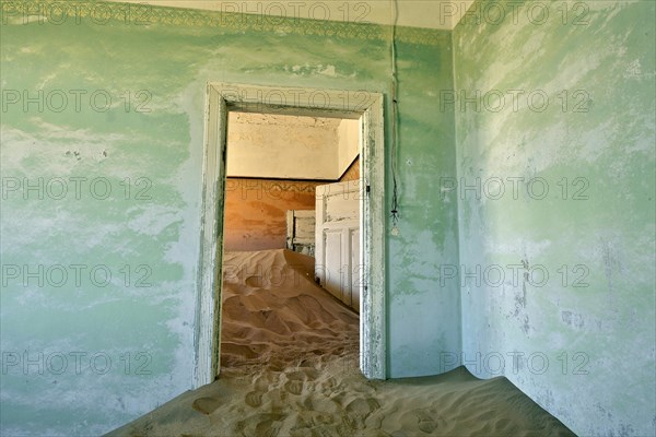 Desert sand in the ruined building of the former diamond city