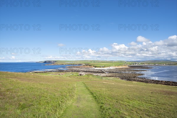 View from the tidal island Brough of Birsay to the island Orkney-Mainland