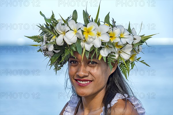 Young woman with flower wreath