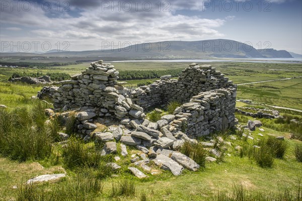 Dilapidated stone walls of a former village