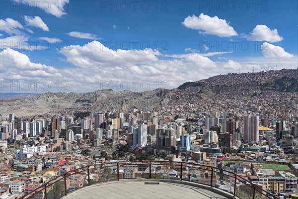 View of the city with skyscrapers in front of the mountains