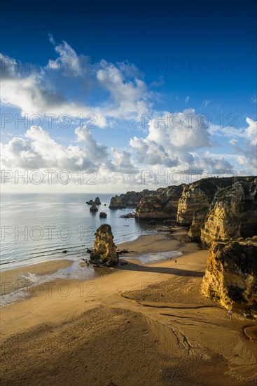 Coloured cliffs and sunrise at the beach