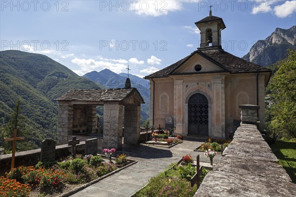 Cemetery with cemetery chapel in the mountain village Isorno
