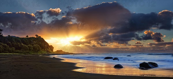 Sunset on the beach of Oakura