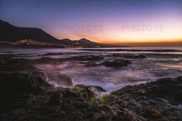Rocky coast and sea at sunset