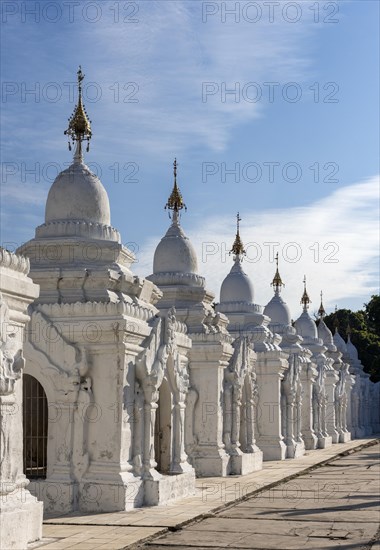 White kyauk gu cave stupas at Kuthodaw Pagoda