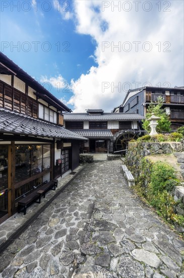 Houses with water wheel