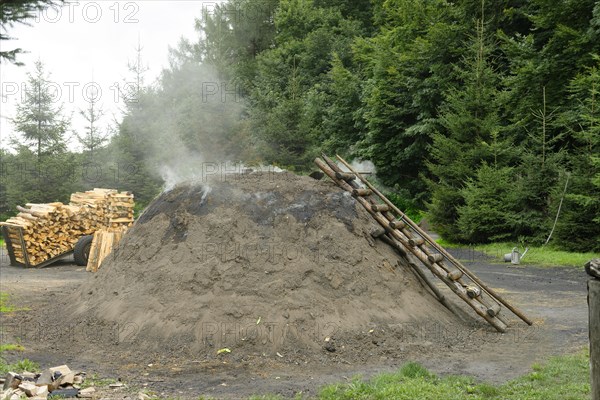 Burning charcoal kiln
