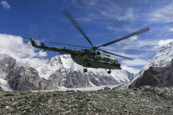Helicopter landing at the Khan Tengri Base Camp