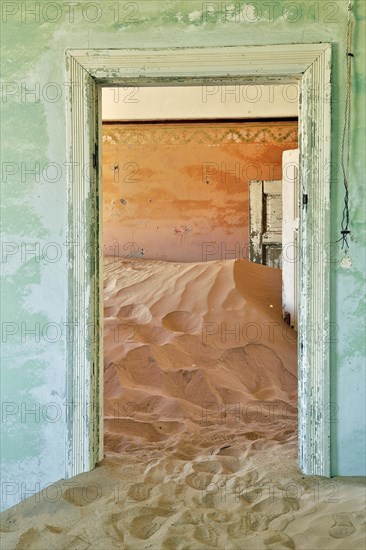 Desert sand in the ruined building of the former diamond city