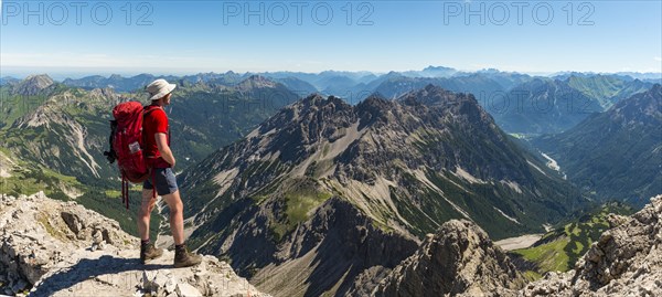 Hiker views of mountains and Alps