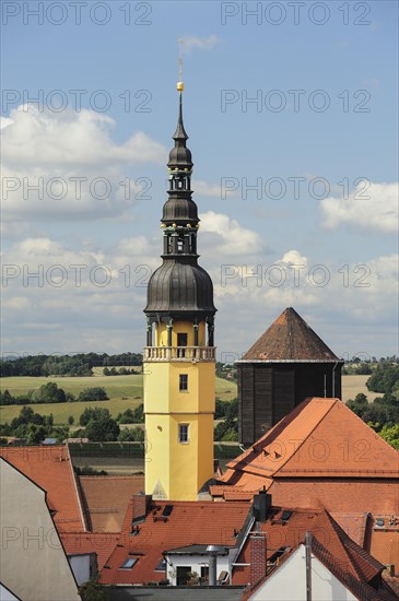 View from Reichenturm onto rooftops of old town with town hall tower and water tower