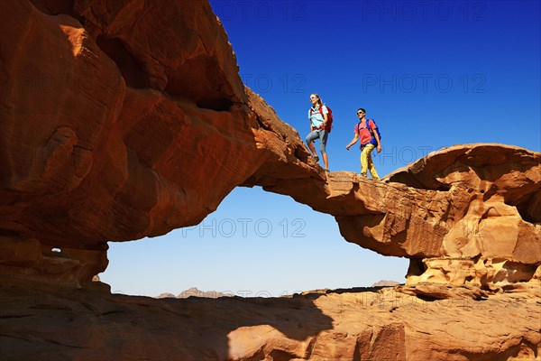 Couple hiking at Rock Arch