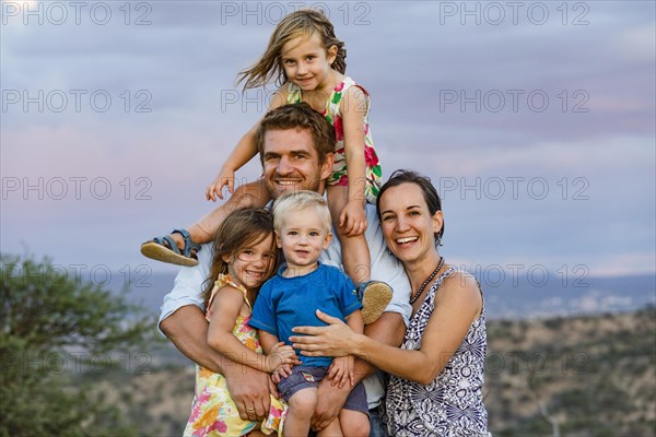 Young family with three small children